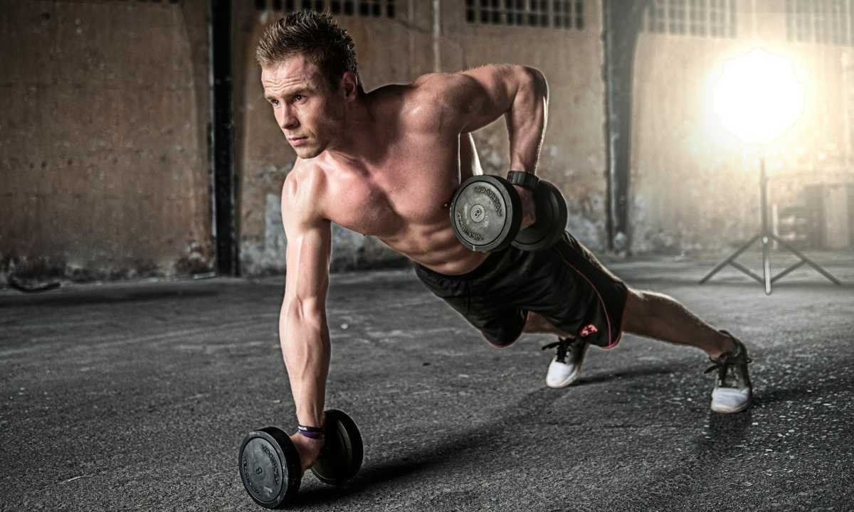Man doing exercise with dumbbells