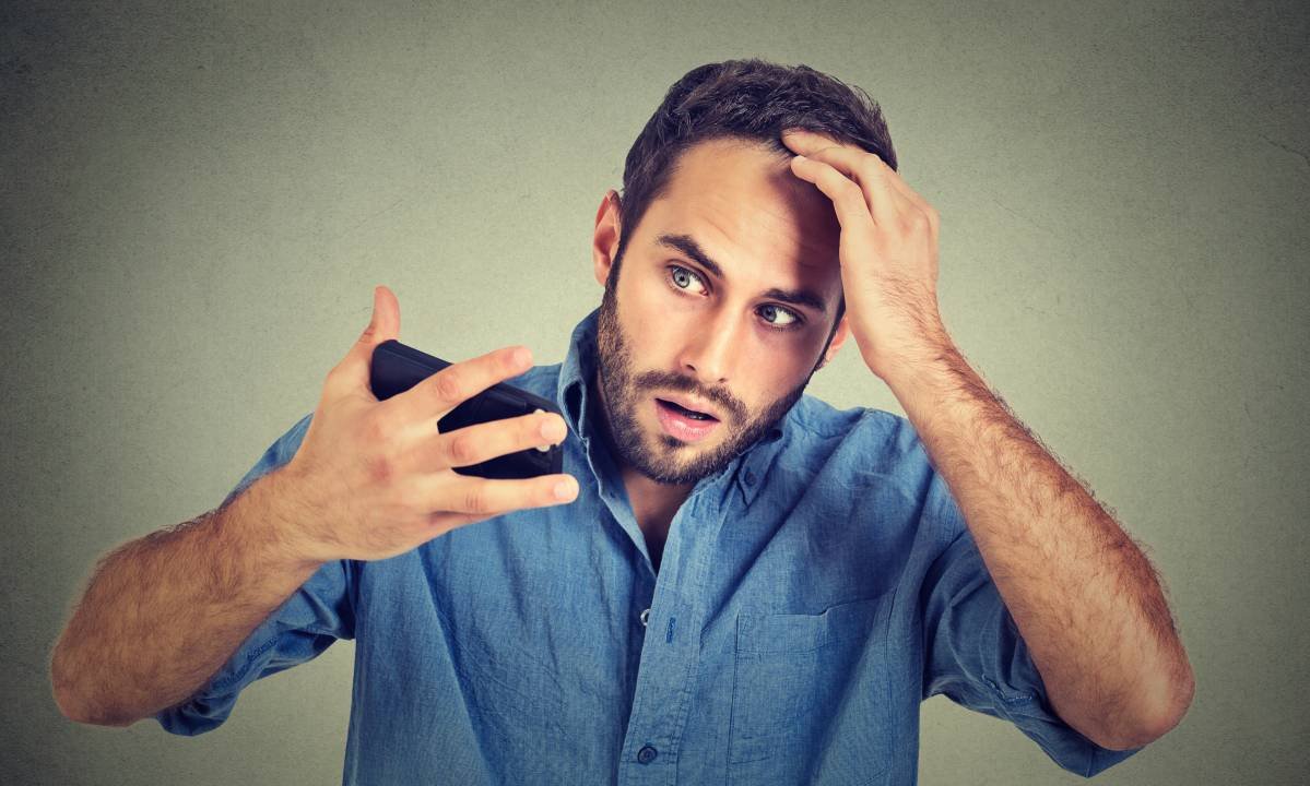 Man Worrying About Hair Loss